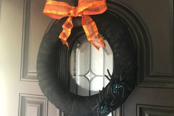 finished black lace halloween wreath on door